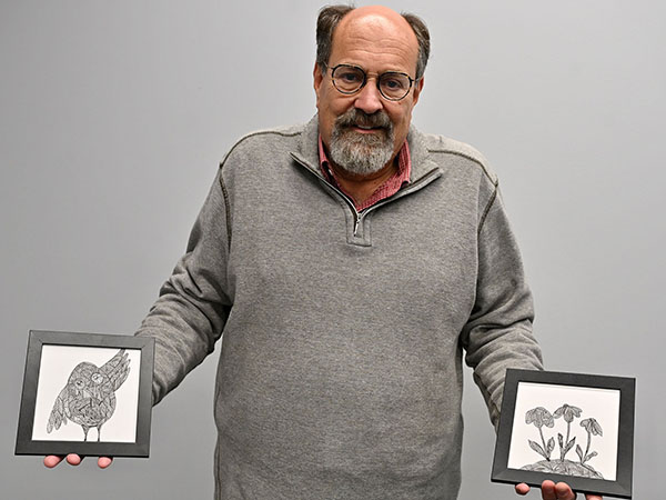 Artist Jon Muller holds a preview of the pieces heading to the Ray Frederick Art Gallery for his 