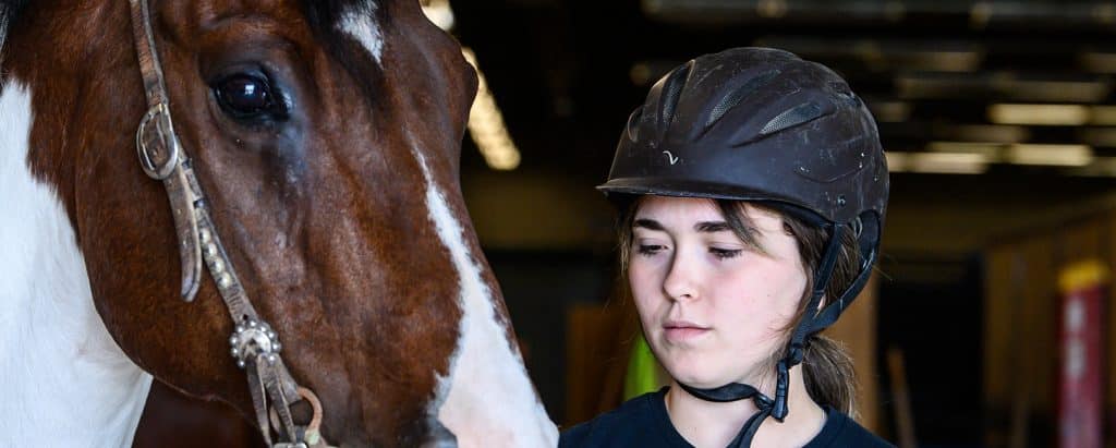 Equine-student-with-horse.