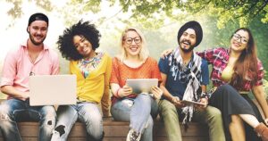 a-stock-photo-of-five-people-hanging-out-on-a-bench