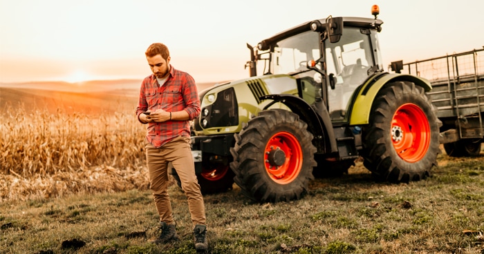 a-stock-photo-of-a-farmer-in-front-of-a-field