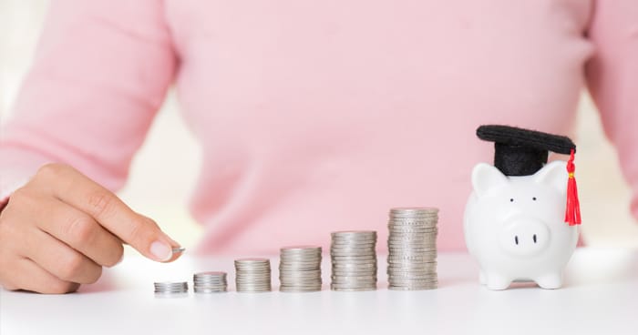 a-stock-photo-of-a-man-stacking-quarters