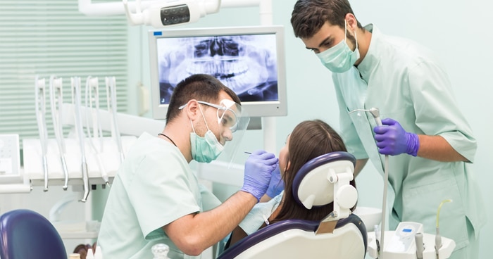 a-stock-photo-of-two-male-dental-hygienists