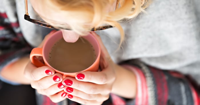 a-stock-photo-of-a-woman-drinking-coffee
