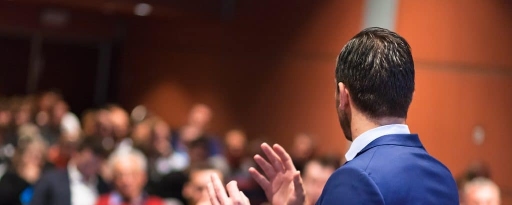 Politician-speaking-to-a-crowd.