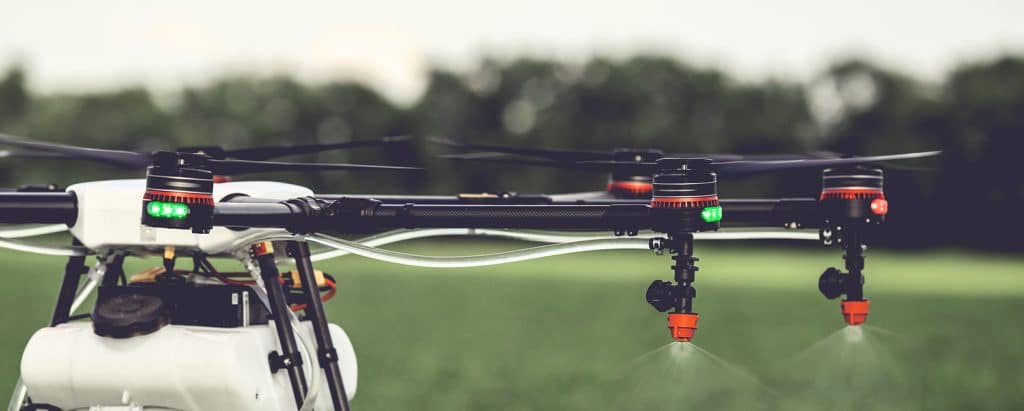 Drone-flying-above-field.