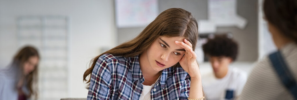 a-header-image-used-for-a-blog-post-of-a-woman-looking-down-puzzled